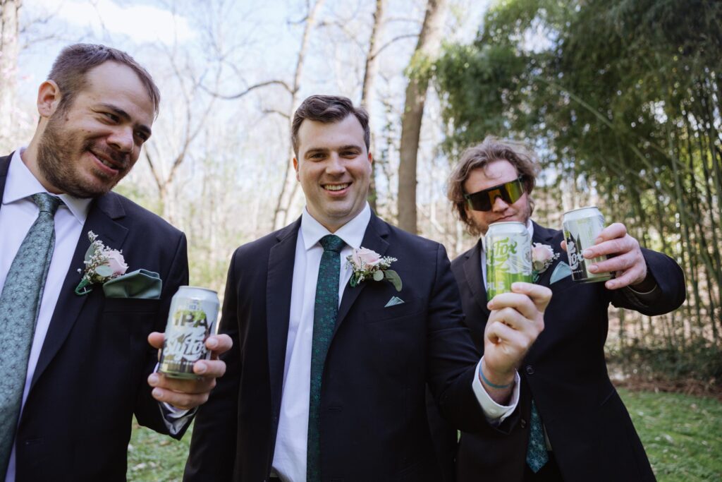 Groomsmen having a beer.