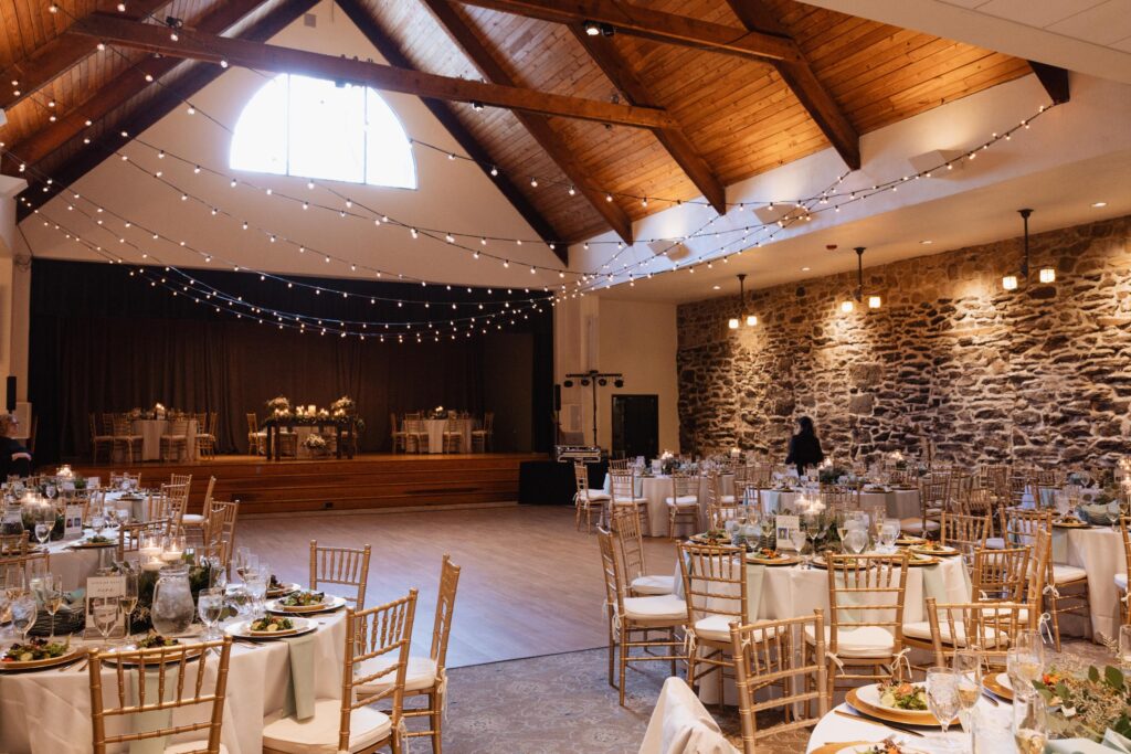 The Old Mill reception hall with dinner tables.