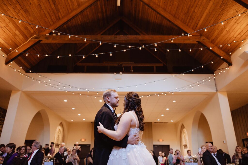 Newlyweds share first dance during reception.