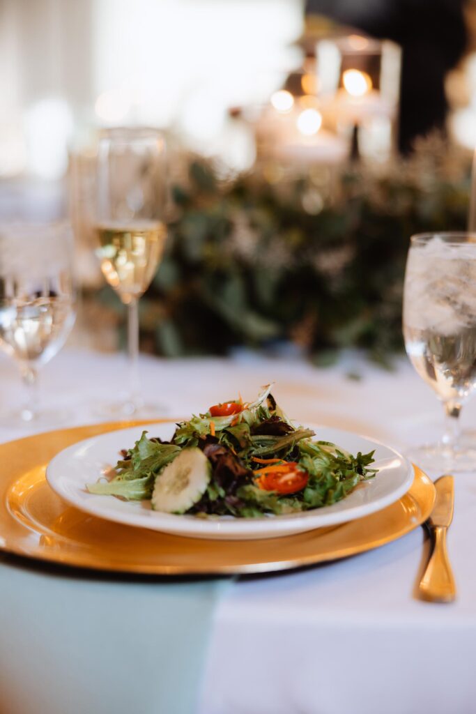 Salad plate on a charger.