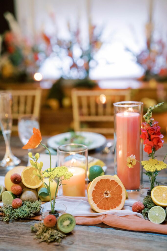 Citrus centerpeice with a candle, grapefruits, kiwis, oranges etc.