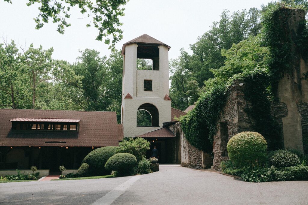 The Old Mill entrance, tower and greenary.